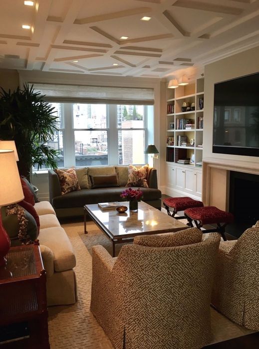 Panelled Residence — The living room under its coffered ceiling